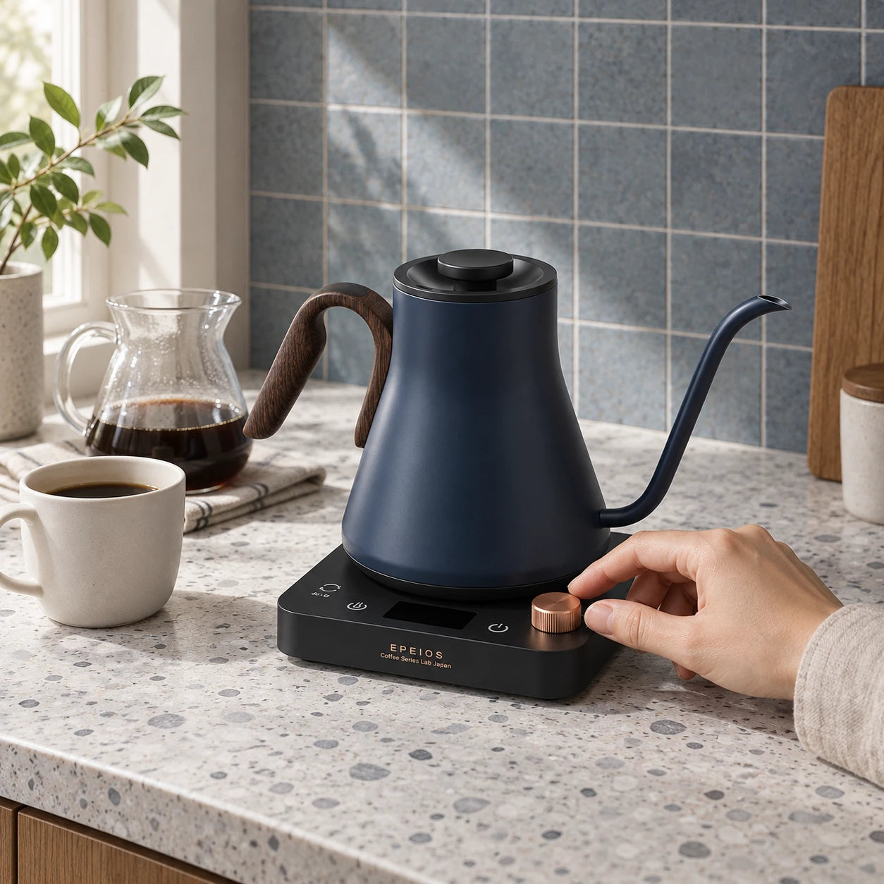 The Navy Blue EPEIOS kettle on a terrazzo coffee counter