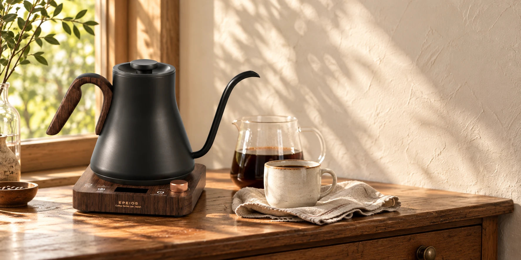 The Black Walnut EPEIOS kettle on an oak sideboard in soft morning light